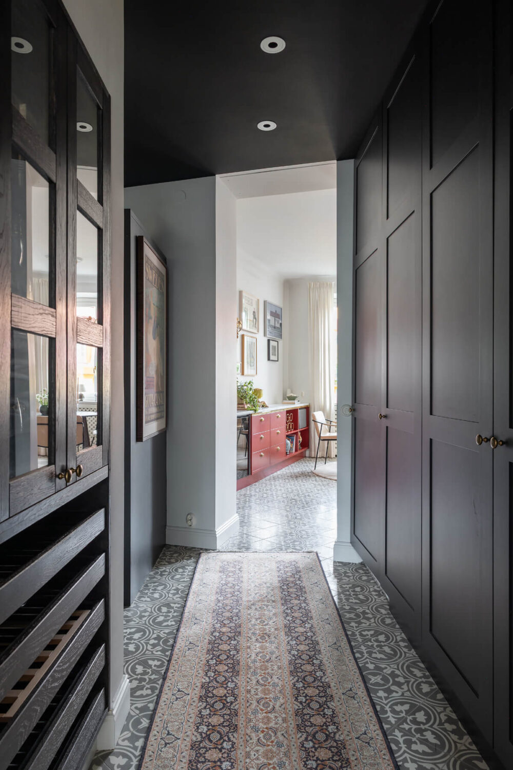 A Red Kitchen in a Grand Swedish Corner Apartment 10 tiled hall with floor to ceiling wardrobes