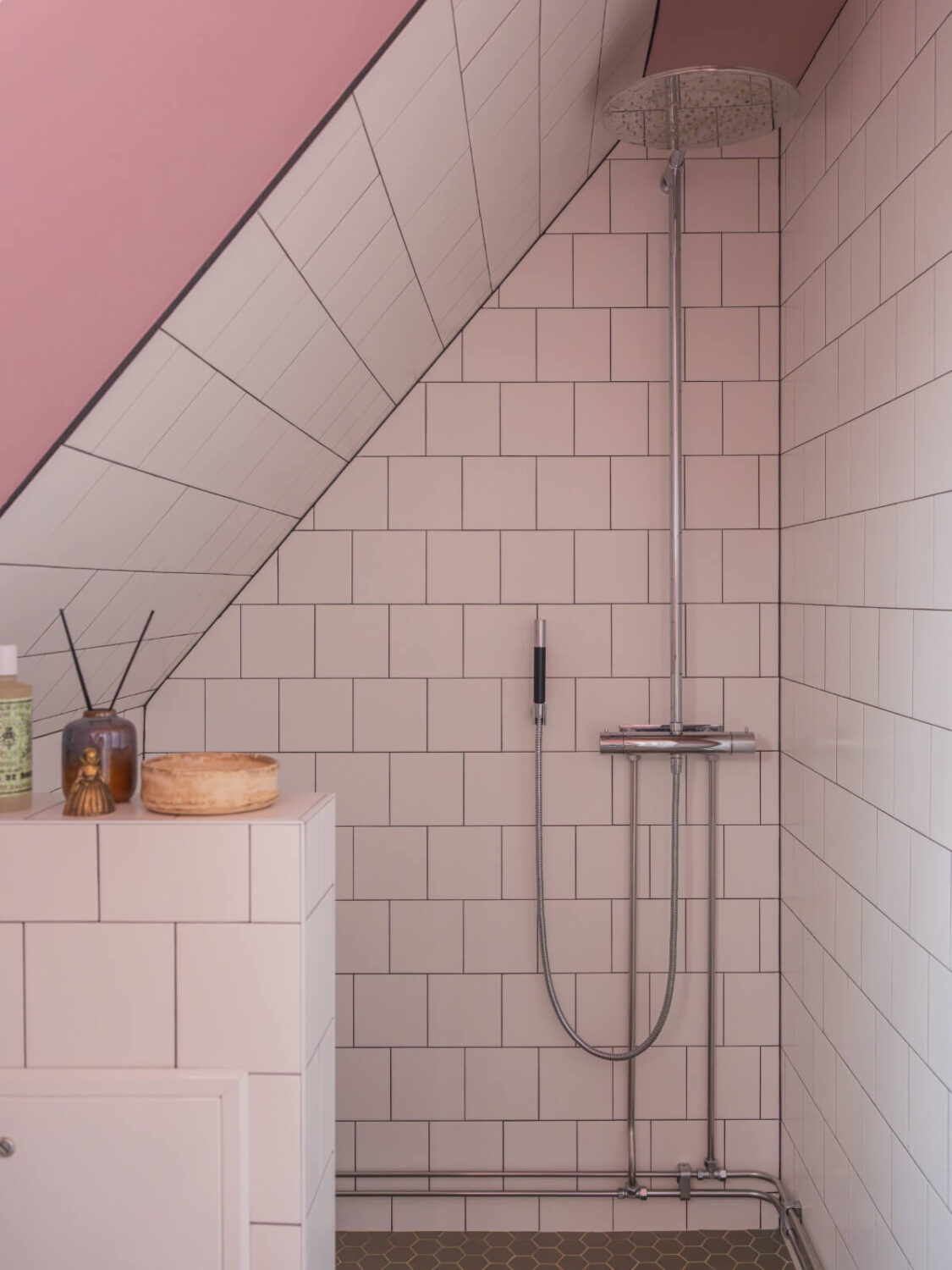 A Beautiful Renovated Family Home with a Charming Garden 33 tiny bathroom slanted ceiling white tiles pink walls