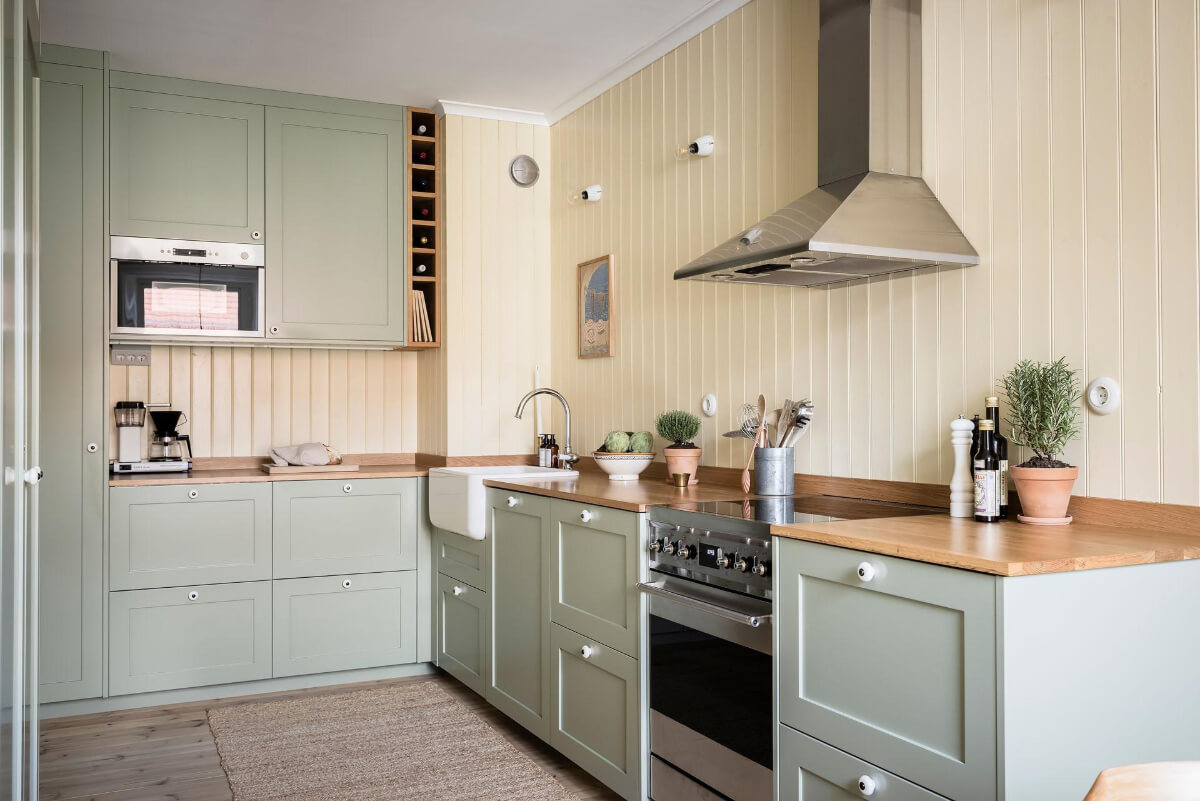 Timeless Charm and Contemporary Design in a 1930s Duplex Apartment 11 tongue and groove paneling kitchen