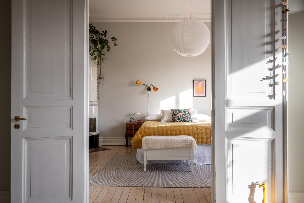 A Light and Spacious Apartment with a Cozy Social Kitchen 7 view into bedroom