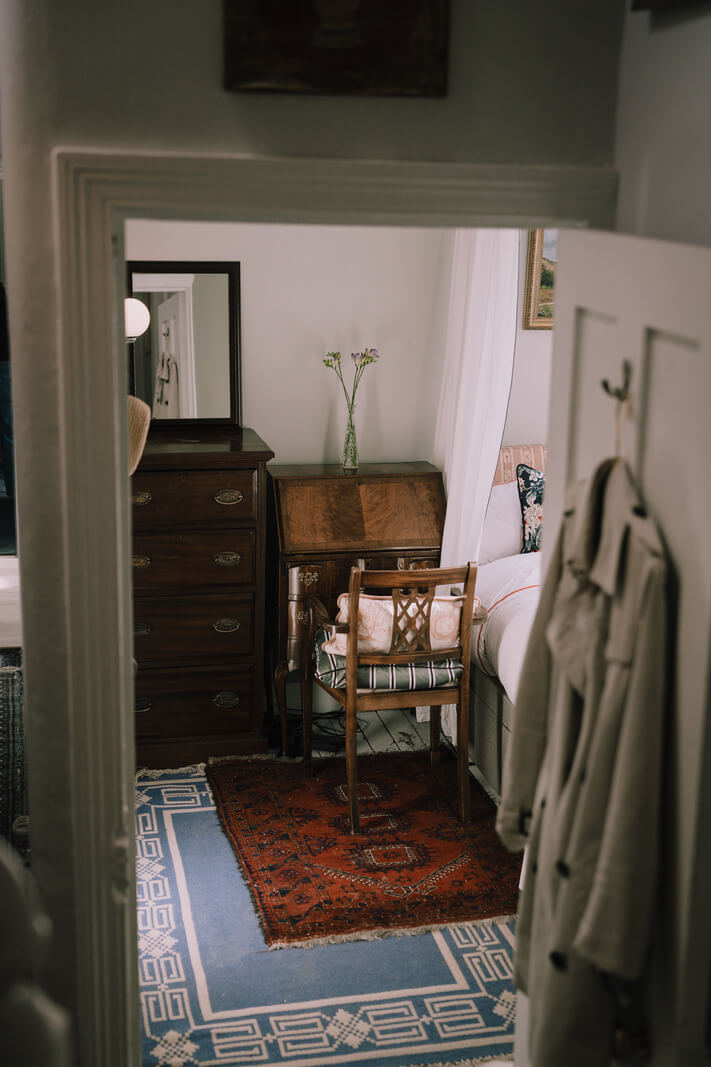 A Carefully Restored Edwardian Apartment with a Garden 13 view into bedroom