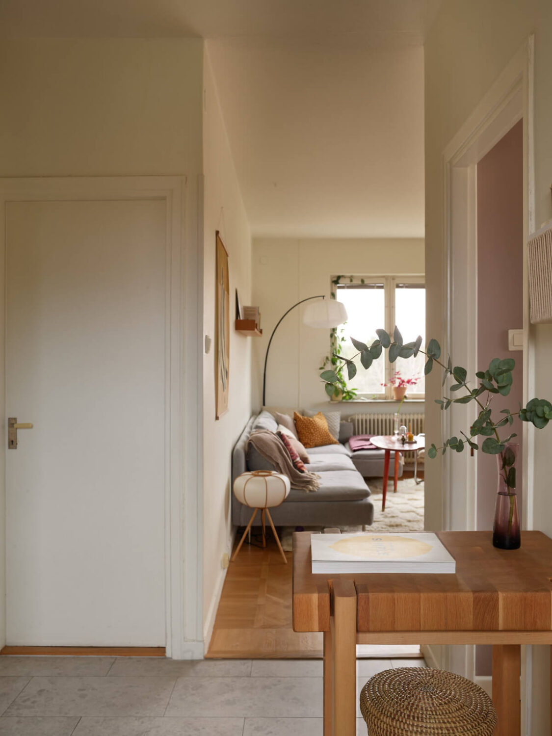 A Renovated 1940s Apartment with Colorful Bedrooms 16 view into living room