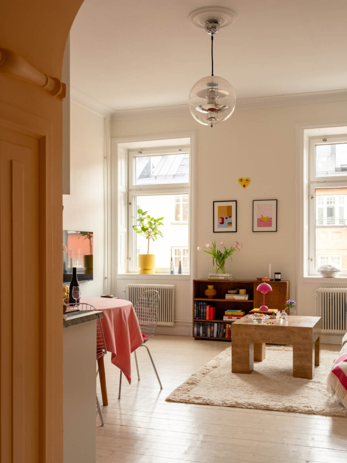 Cheerful Color Accents in a One-Bedroom Stockholm Apartment 9 view into living room