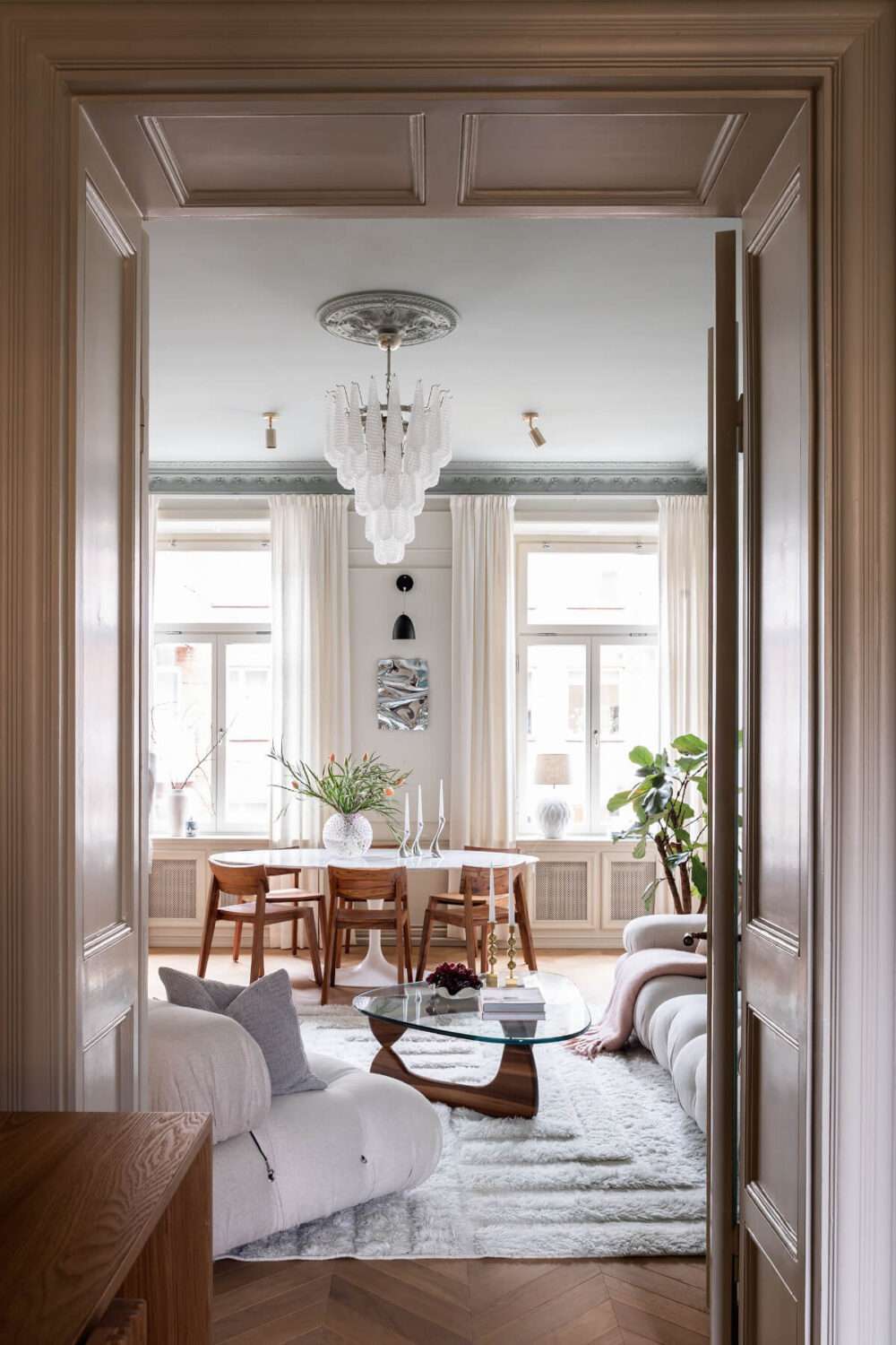 A Luxurious Stockholm Apartment with Period Features and a Blue Fireplace 6 view into living room