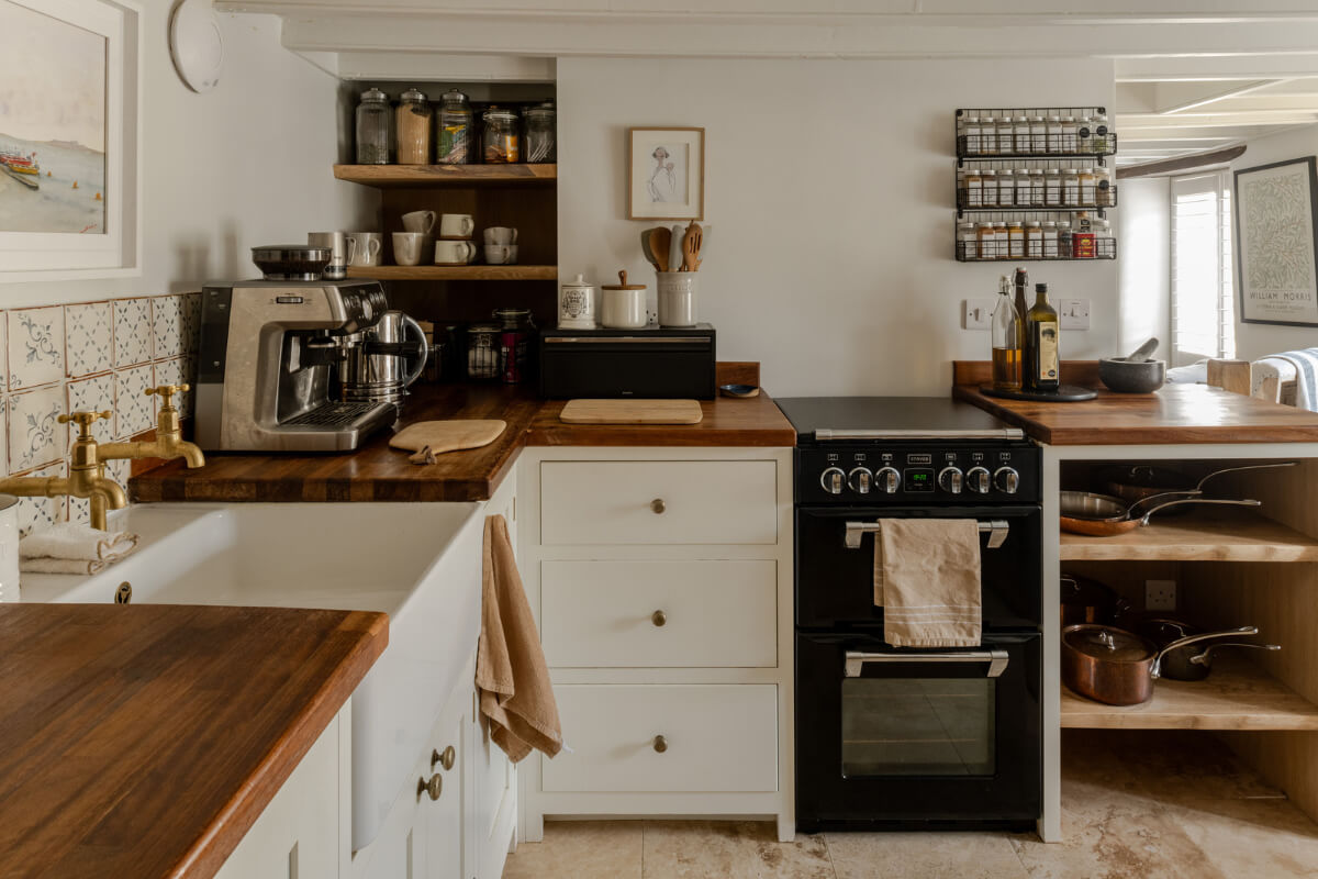 A Charming Stone Cottage with Period Features in Cornwall 6 white kitchen antique tiles wooden countertop