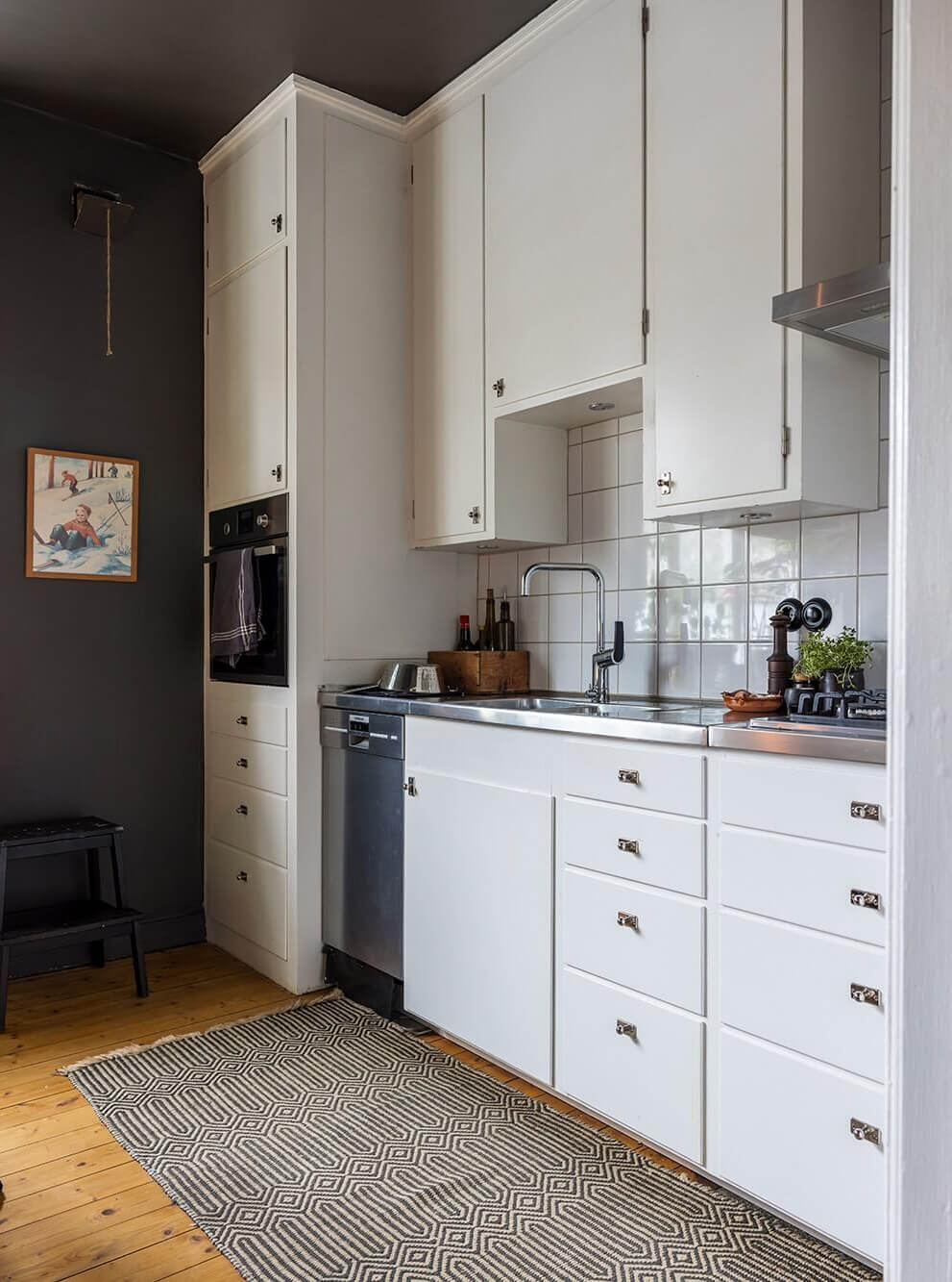 A Cozy Studio Apartment in a 1930s Building 9 white kitchen gray walls and ceiling