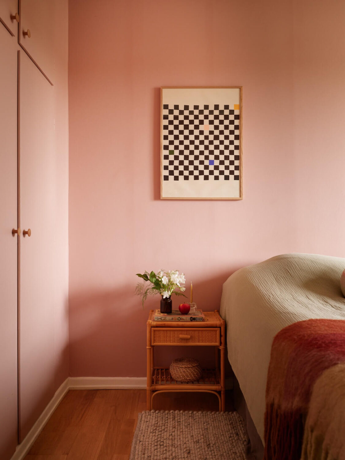 A Renovated 1940s Apartment with Colorful Bedrooms 19 wicker nightstand