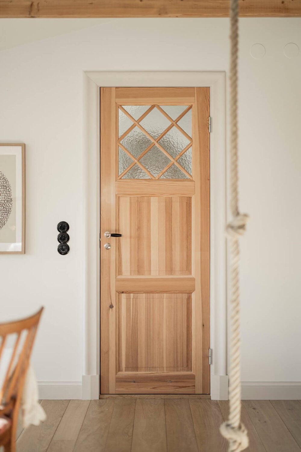 A Swedish Duplex Apartment Inspired by A Danish Summer House 13 wooden door
