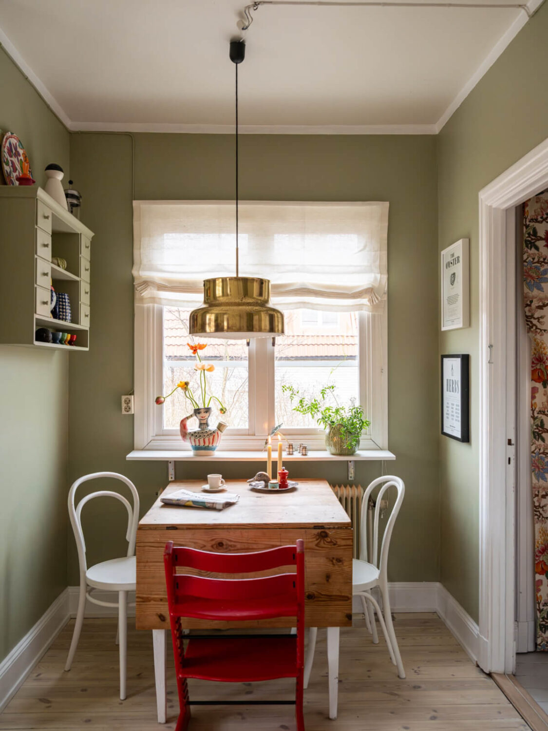 A Beautiful Renovated Family Home with a Charming Garden 14 wooden kitchen table green walls