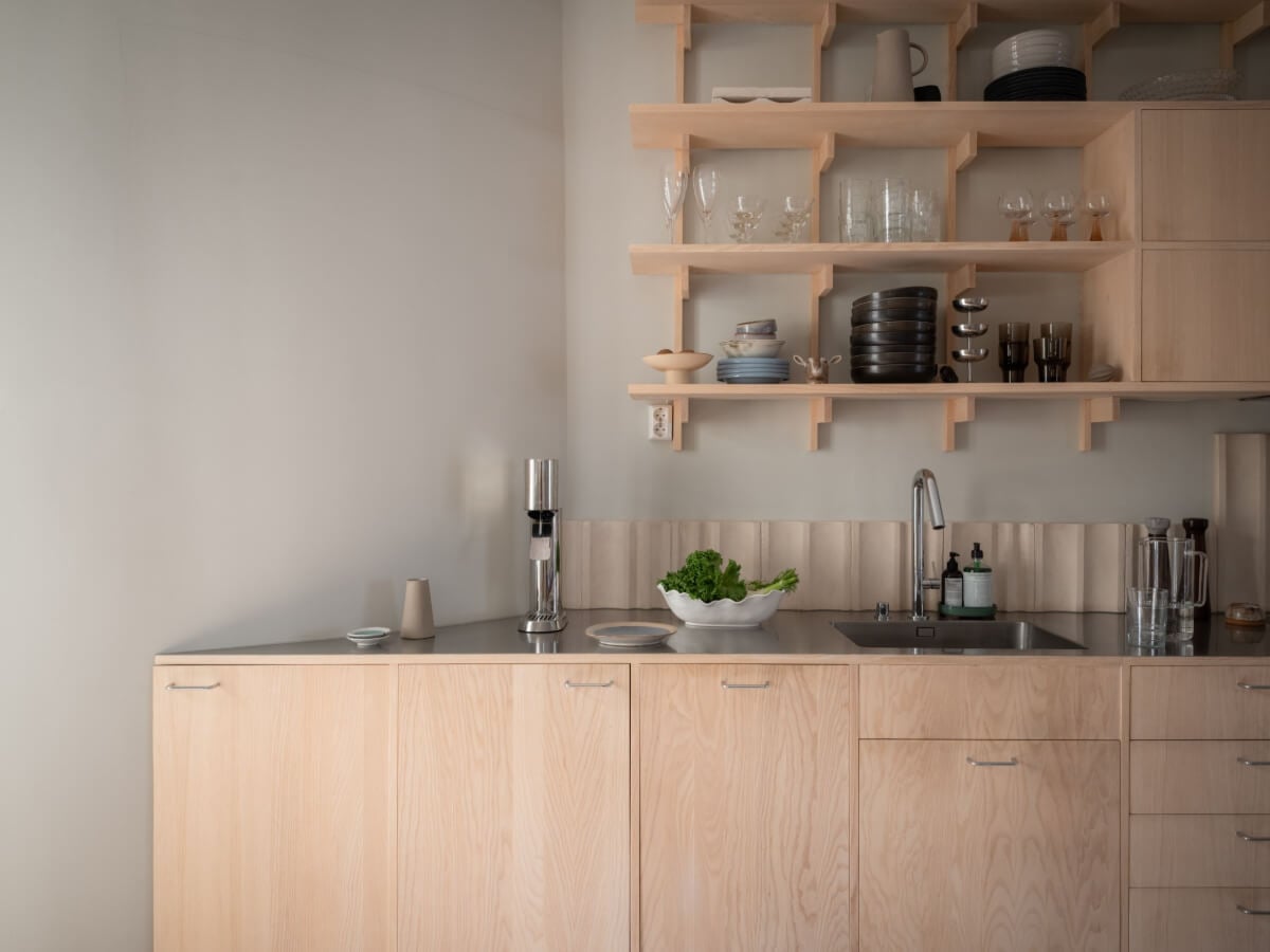 A Calm Color Palette in a Charming Swedish Apartment 13 wooden kitchen