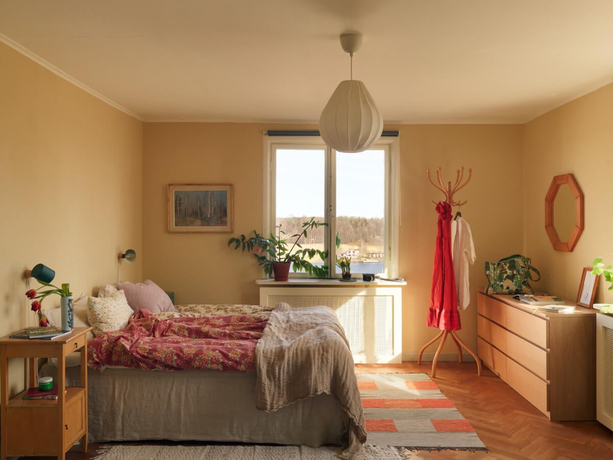 A Grand Family Home in a Former Swedish Doctor's Villa 29 yellow bedroom