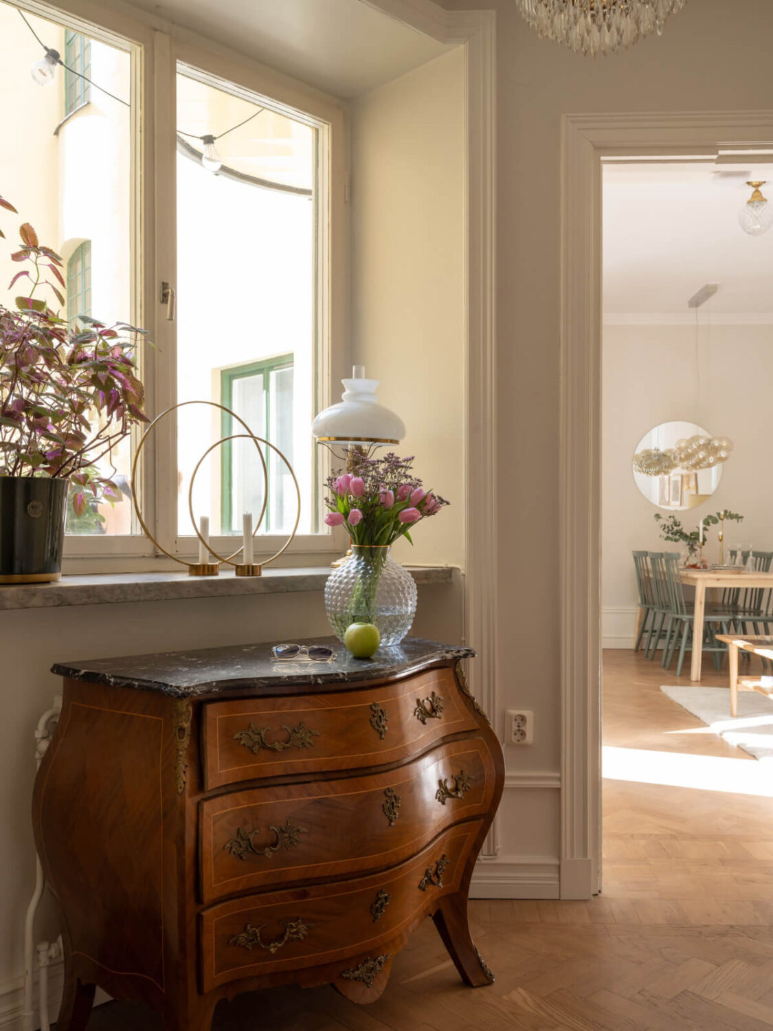 A Small Apartment with Green Color Accents and a Cozy Patio Terrace 16 antique cabinet