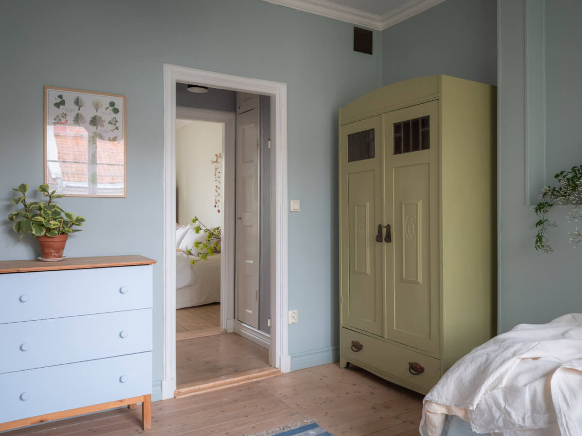 A Soft Color Palette and a Charming Kitchen in a Swedish Apartment 32 antique painted wardrobe