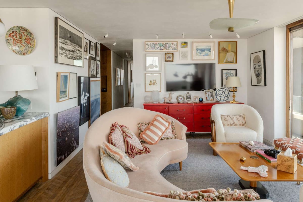 Oak and Marble in a Spectacular Brutalist Apartment in London 2 art-filled living room
