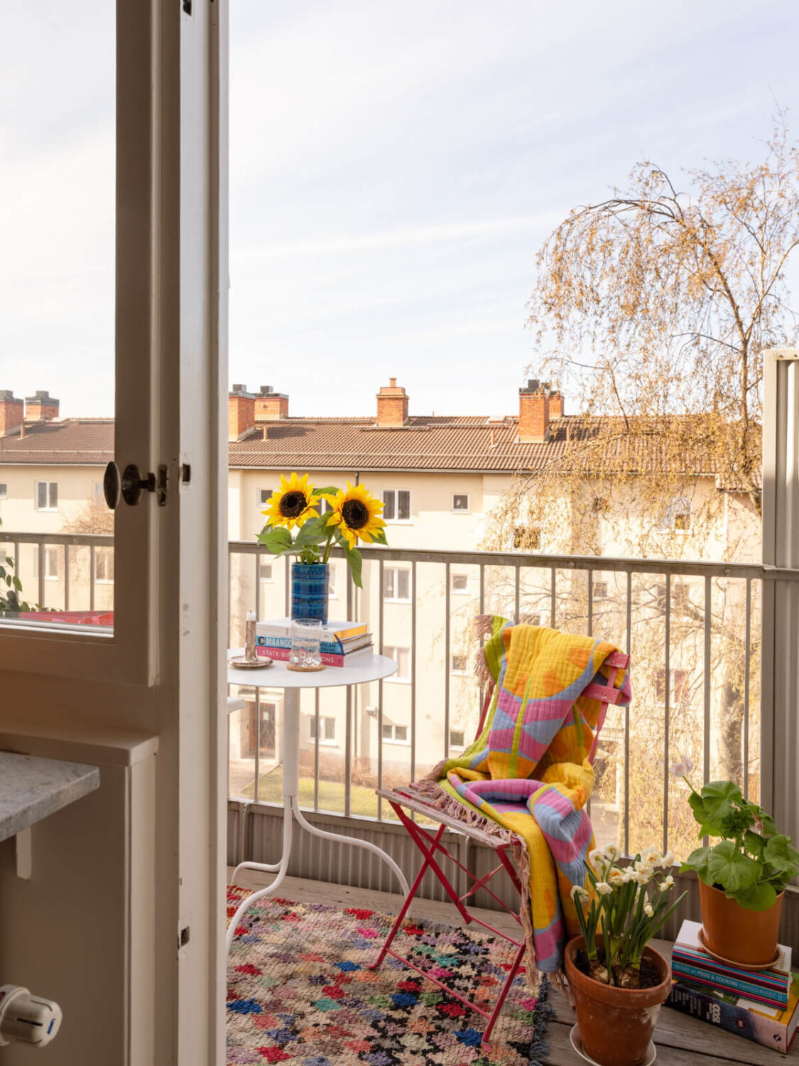 Color Accents in a Renovated Midcentury Apartment in Stockholm 8 balcony