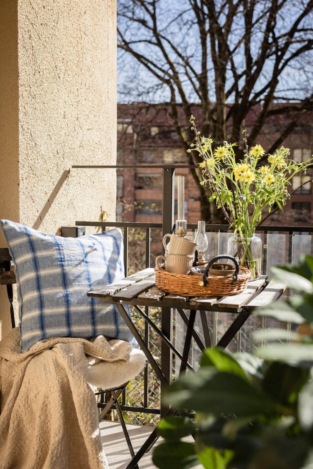 A Bright One-Bedroom Apartment with a Large Balcony 26 balcony-table