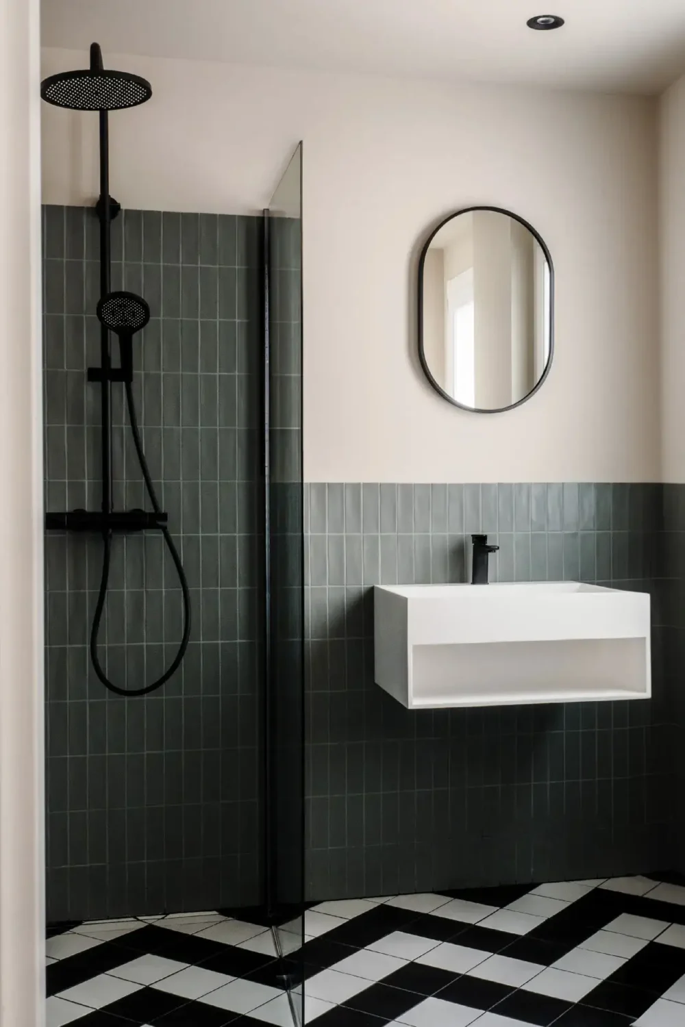A Luxurious Palma Residence Where Historic Charm Meets Modern Elegance 15 bathroom black and white floor tiles green wall tiles