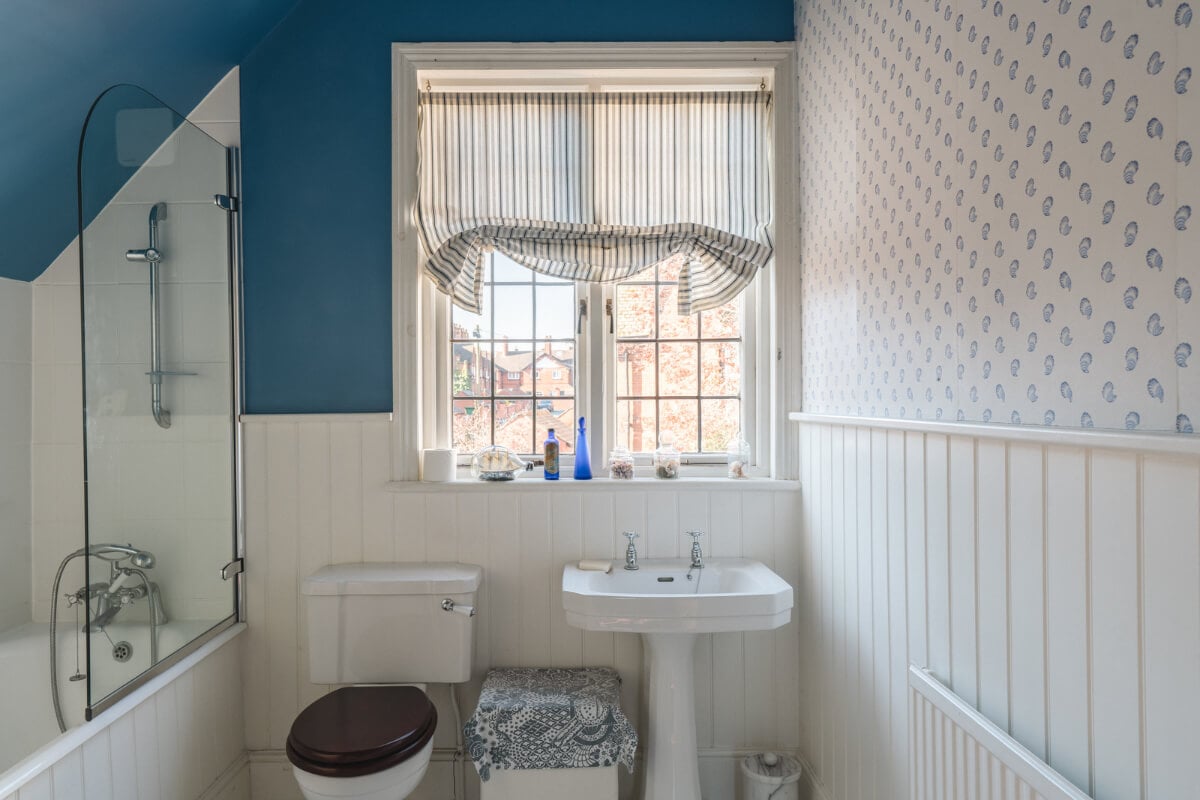 A Sage Green Kitchen in a Charming Arts and Crafts House 15 bathroom blue walls wallpaper