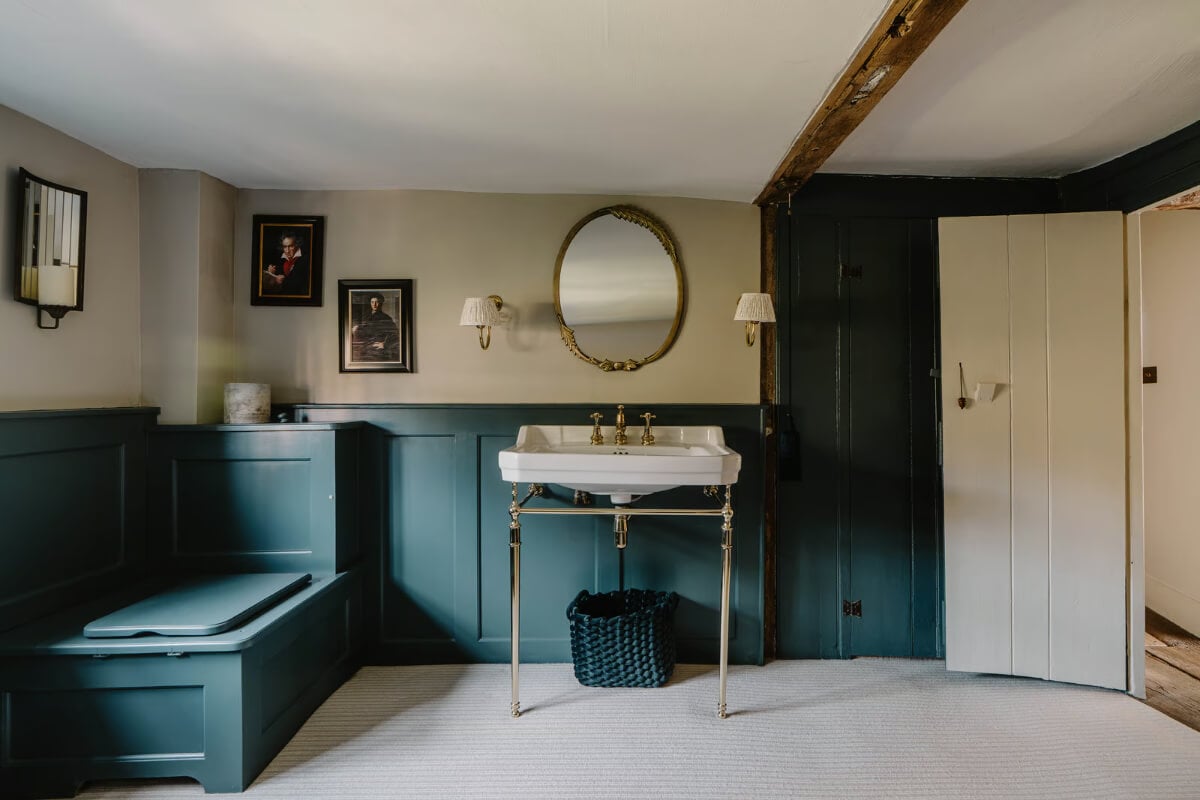 Serene Colors and Historic Elements in an Elizabethan Home in Wiltshire 15 bathroom blue wood paneling