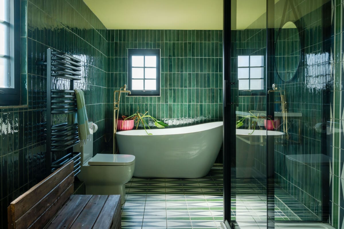 Colorful Design and Historic Features in a Charming English Home 12 bathroom freestanding bath and shower green tiles nordroom
