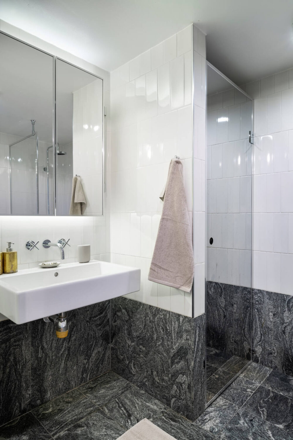 Pale Blue Walls and Huge Windows in a Swedish Loft Apartment 26 bathroom marble tiles