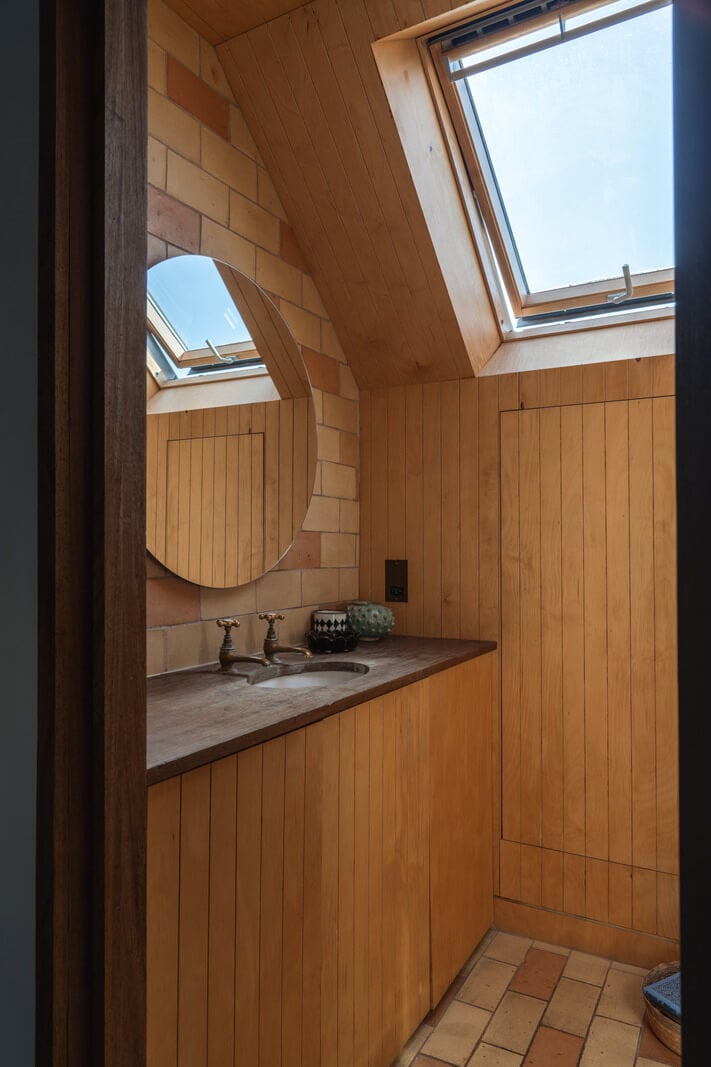 An Edwardian House with Muted Tones, Natural Materials, and a Landscaped Garden 25 bathroom slanted ceiling An Edwardian House with Muted Tones, Natural Materials, and a Landscaped Garden