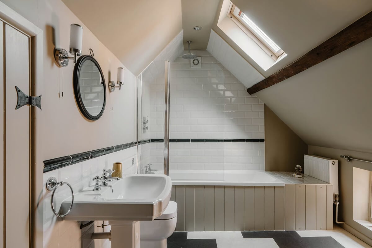 Serene Colors and Historic Elements in an Elizabethan Home in Wiltshire 23 bathroom slanted ceilings