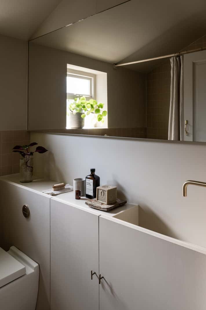 Natural Materials and Period Features in a Restored Victorian House 19 bathroom sleek built-in sink