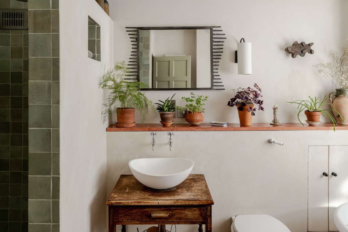 Reclaimed Materials and Custom Storage in a Serene London Home 18 bathroom vintage vanity table with sink