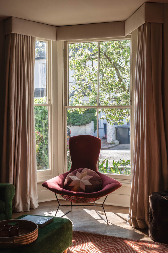 An Edwardian House with Muted Tones, Natural Materials, and a Landscaped Garden 3 bay window