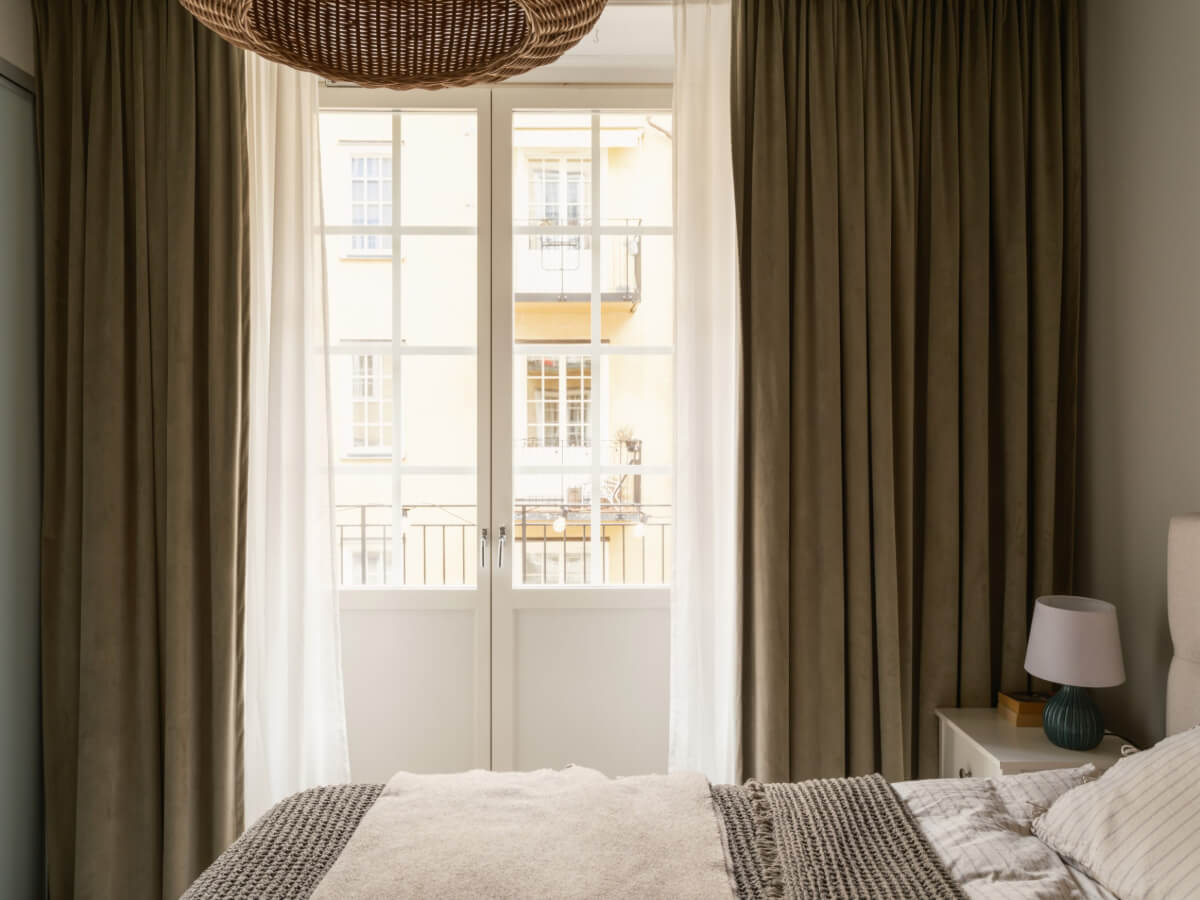 A Muted Palette and a Cozy Kitchen Breakfast Nook in a Swedish Apartment 15 bedroom balcony door