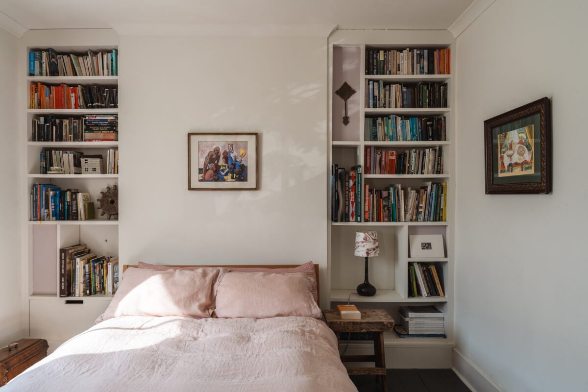 An Edwardian House with Muted Tones, Natural Materials, and a Landscaped Garden 19 bedroom built-in bookshelves