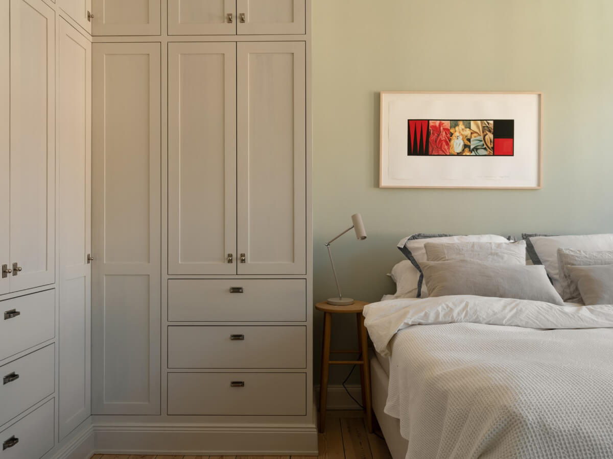 Turn-of-the-Century Charm and Site-Built Storage in a Stockholm Apartment 22 bedroom built-in corner wardrobes