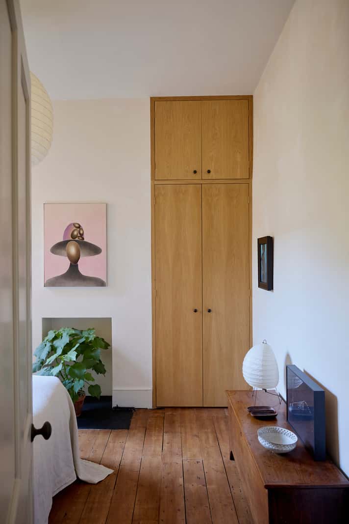 Bespoke Oak Cabinets and Plaster Walls in a London Garden Apartment 19 bedroom built-in oak wardrobes