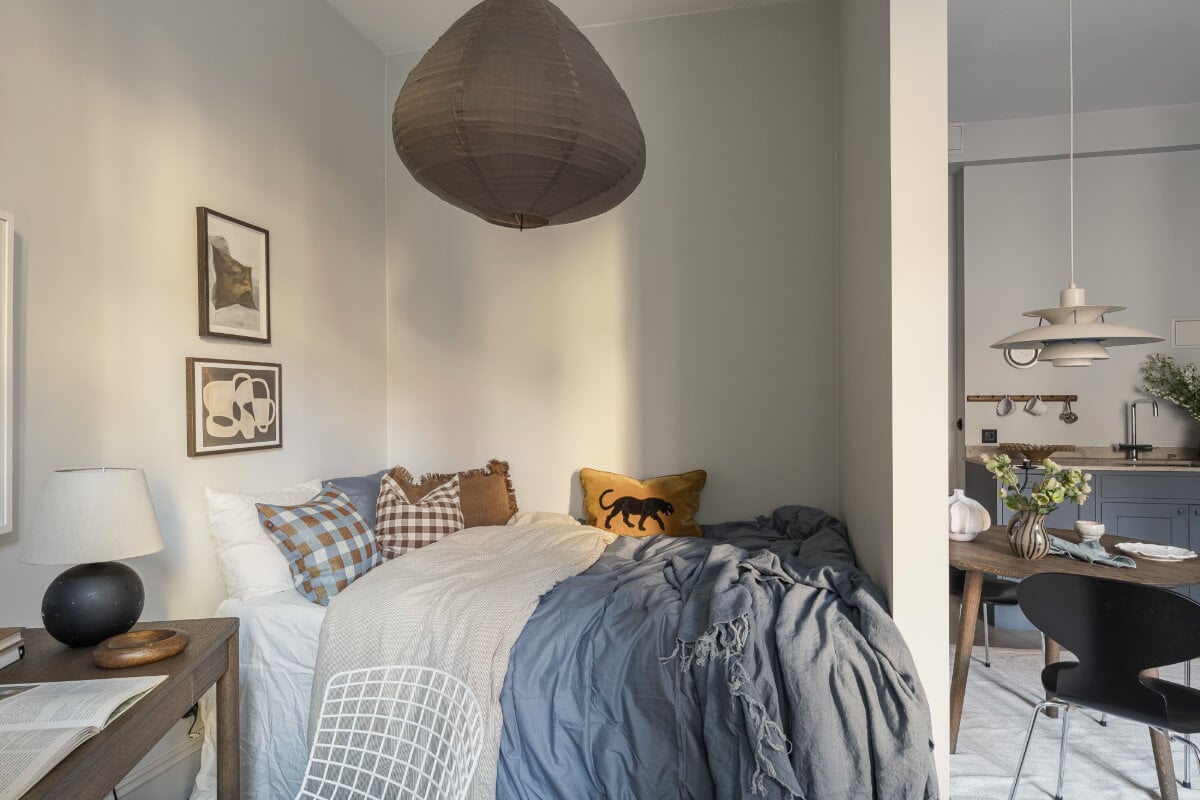 A Stylish Swedish Studio Apartment with a Blue Kitchen 16 bedroom niche