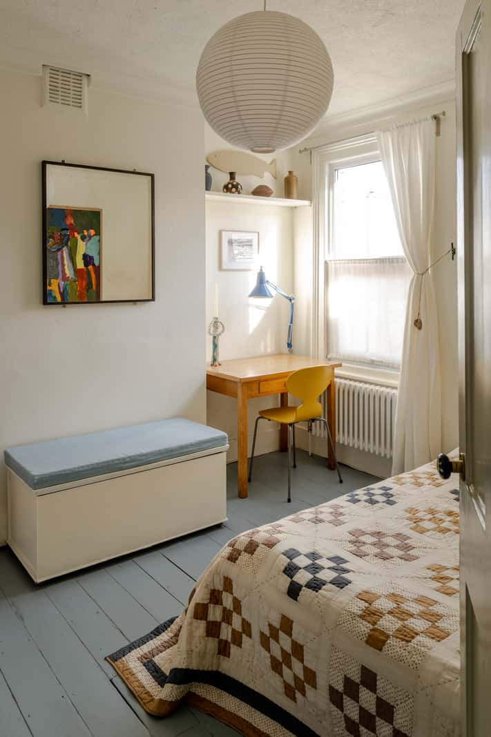 Reclaimed Materials and Custom Storage in a Serene London Home 16 bedroom painted floorboards