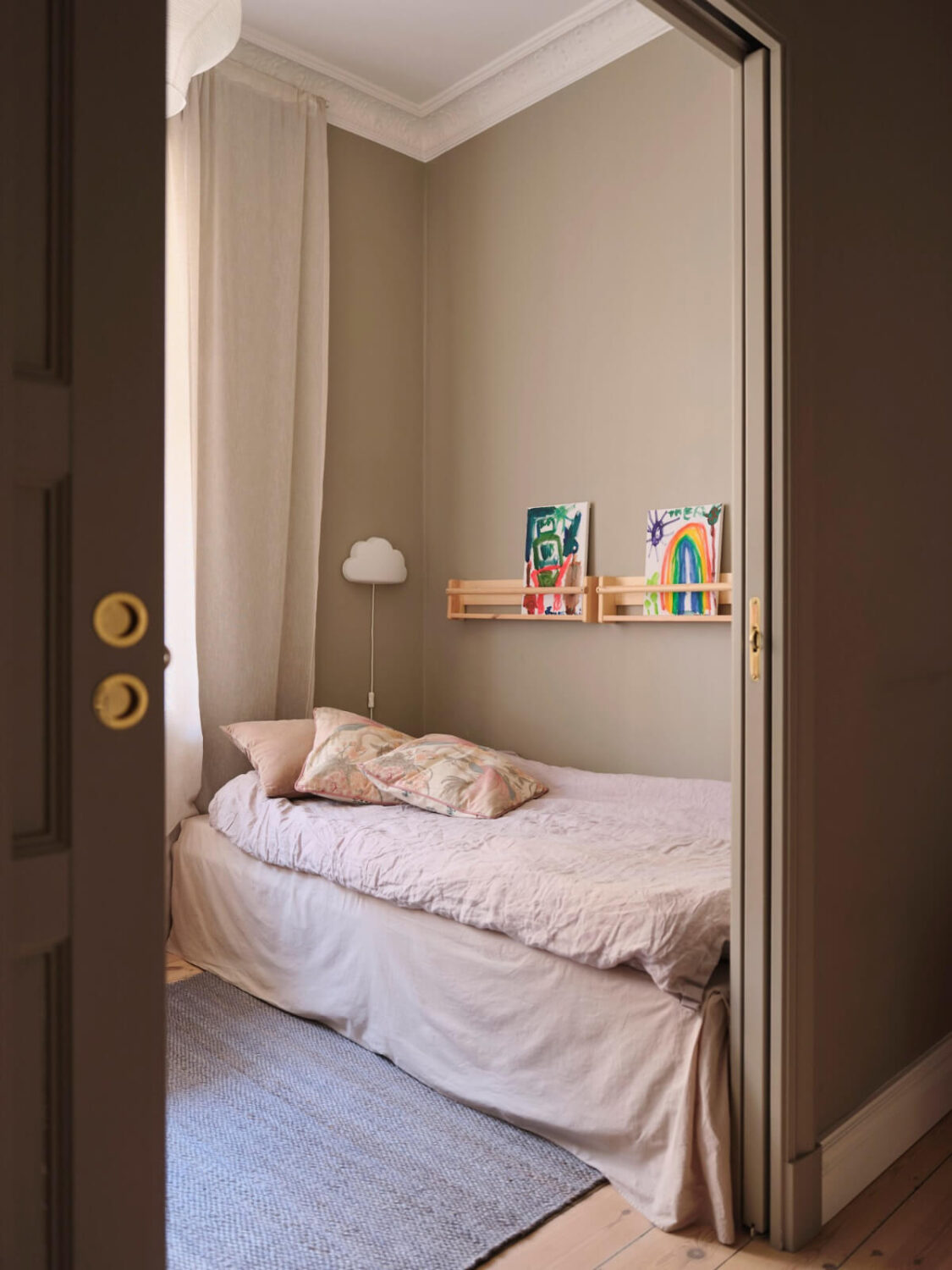 A Spacious Turn-of-the-Century Apartment with Nice Color Accents 24 bedroom pocket doors