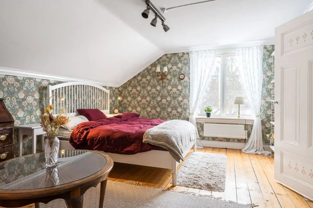 A Cozy Country House in Sweden Filled with Wallpapers 27 bedroom rustic floorboards wallpaper