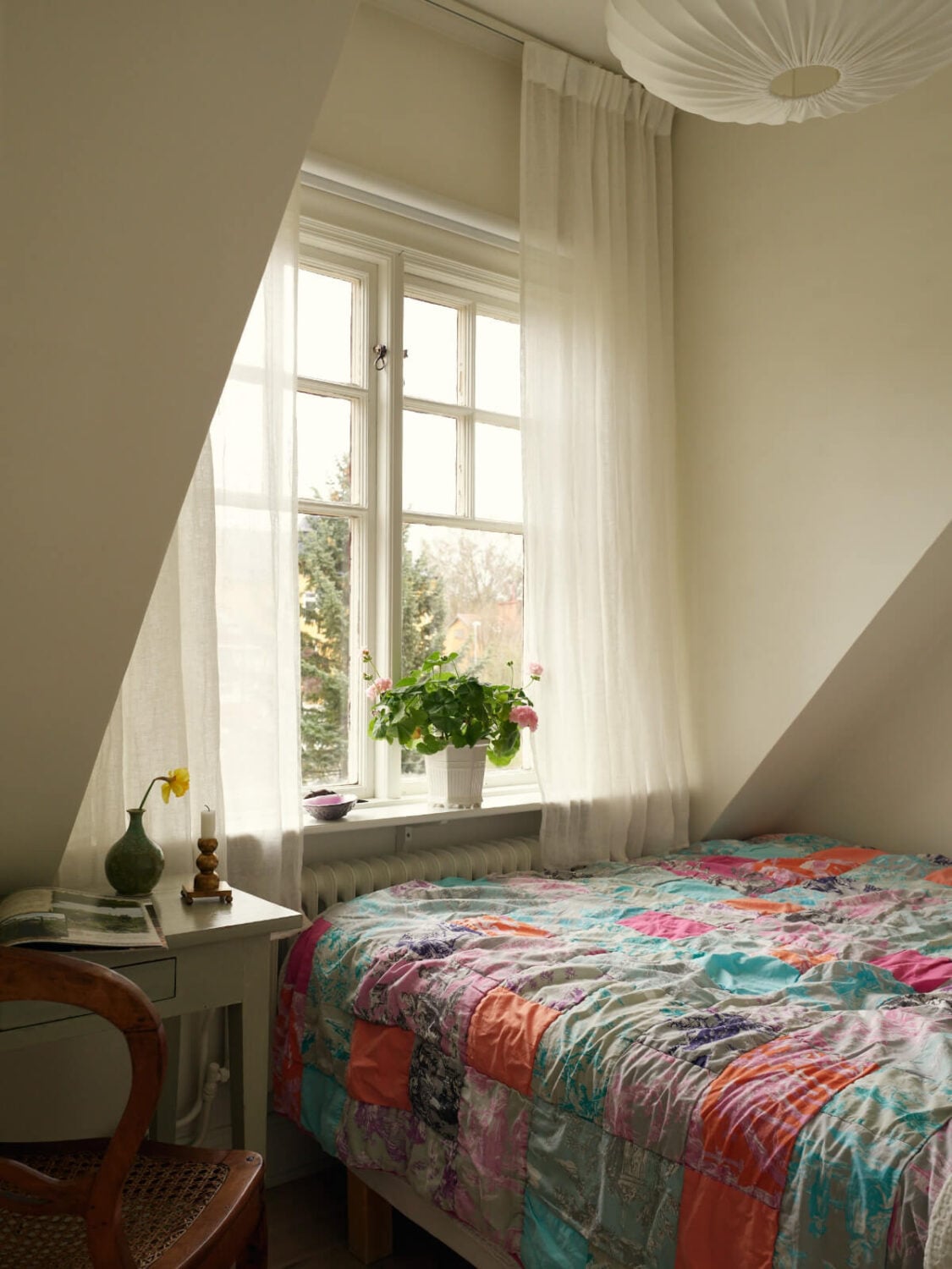 A Charming Semi-Detached House in the First Garden Town of Stockholm 23 bedroom slanted ceiling large window