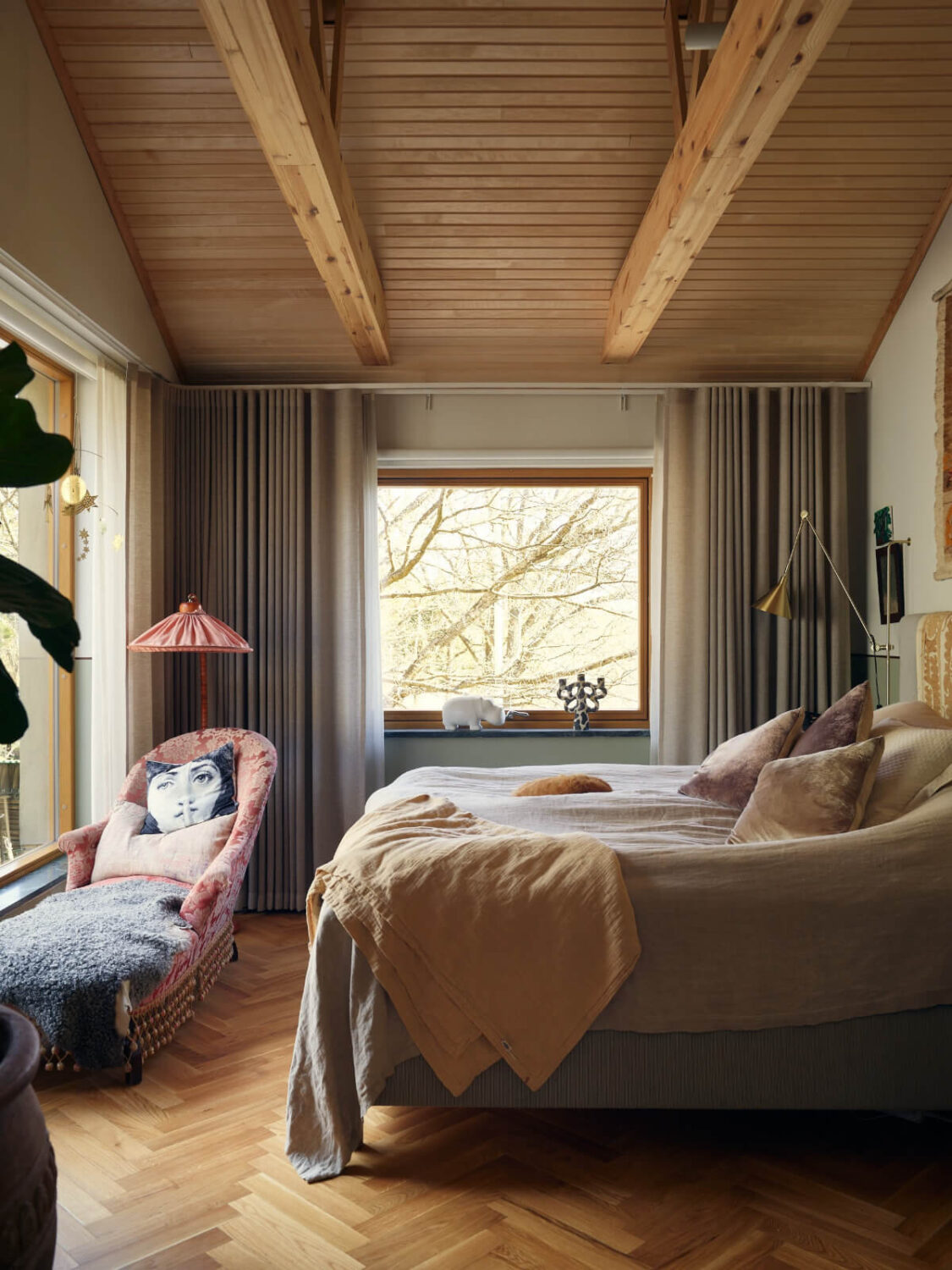 A Personal and Cozy 1960s Family Home in Sweden 14 bedroom timber ceiling wooden beams