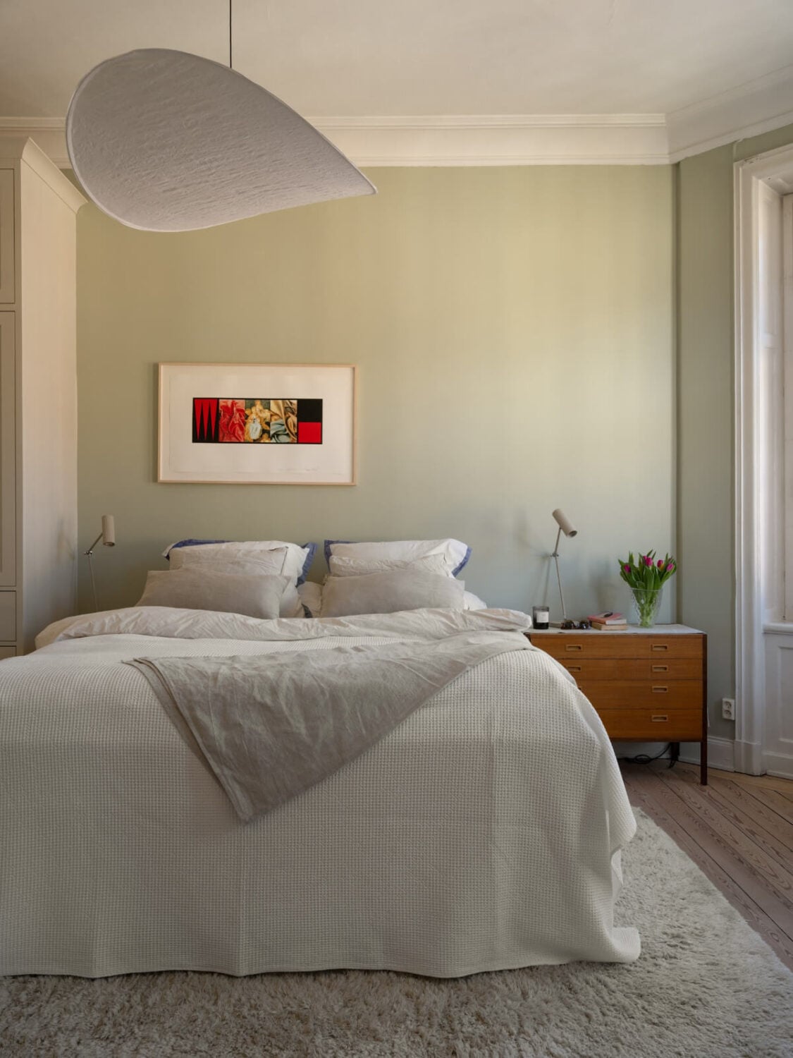 Turn-of-the-Century Charm and Site-Built Storage in a Stockholm Apartment 16 bedroom with dresser as nighstand