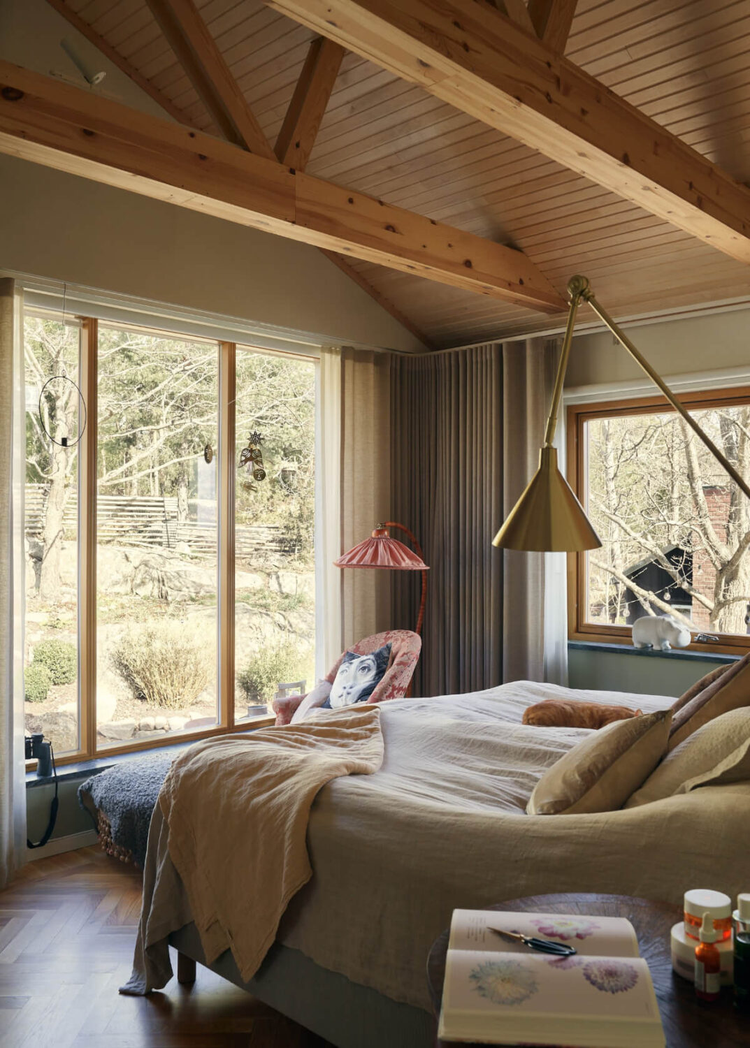 A Personal and Cozy 1960s Family Home in Sweden 13 bedroom wooden pitched ceiling exposed beams