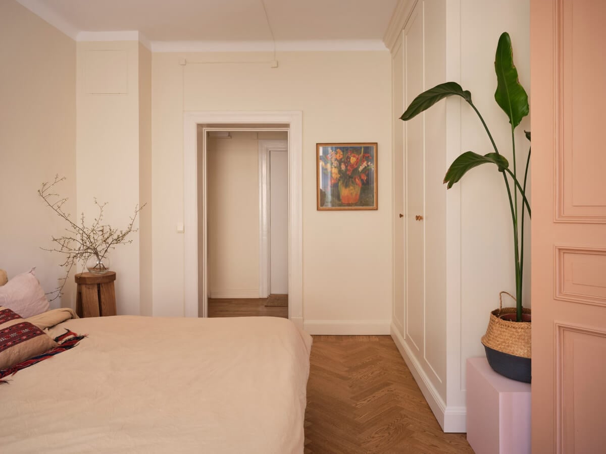 Warm, Natural Light in a Renovated Turn-of-the-Century Apartment 12 beige bedroom built-in wardrobes