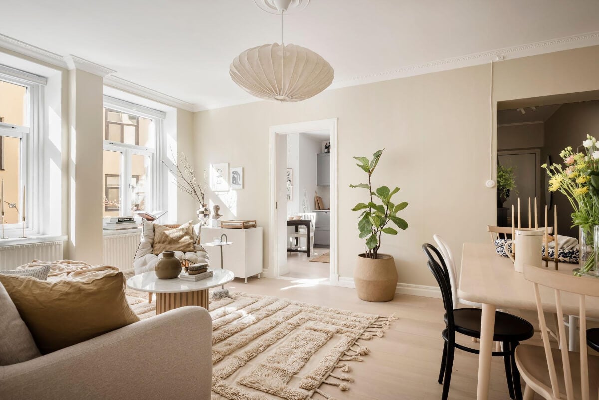 A Bright One-Bedroom Apartment with a Large Balcony 9 beige walls scandi living room