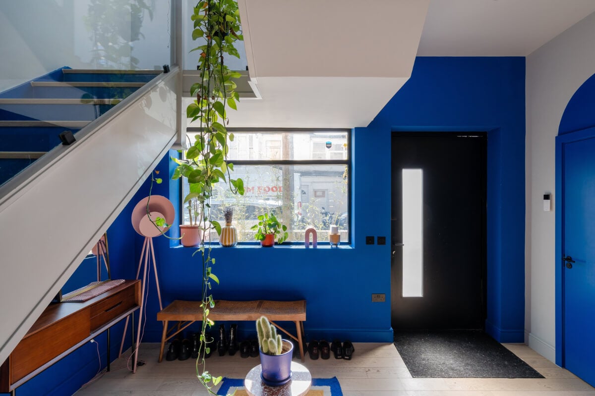Arched Shapes and Hand-Painted Murals in a Joyful London Townhouse 5 blue hall