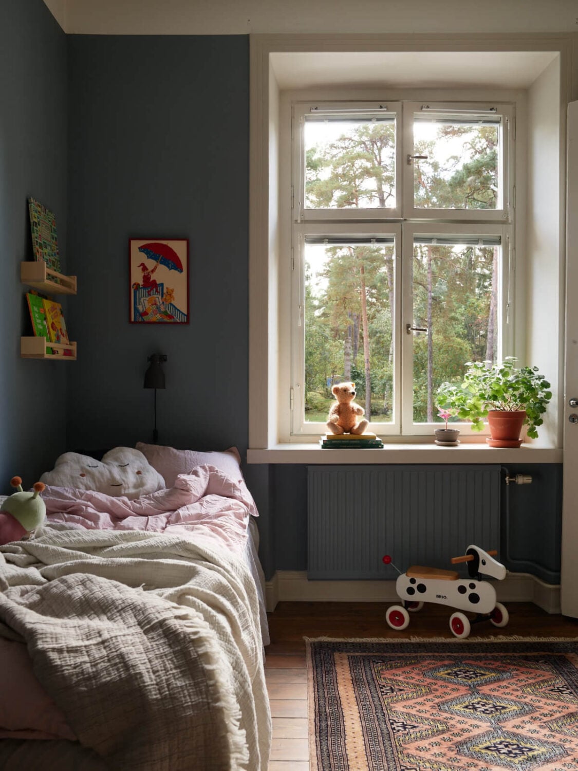 A Nature-Inspired Color Palette in a Stockholm Apartment 22 blue kids bedroom large window