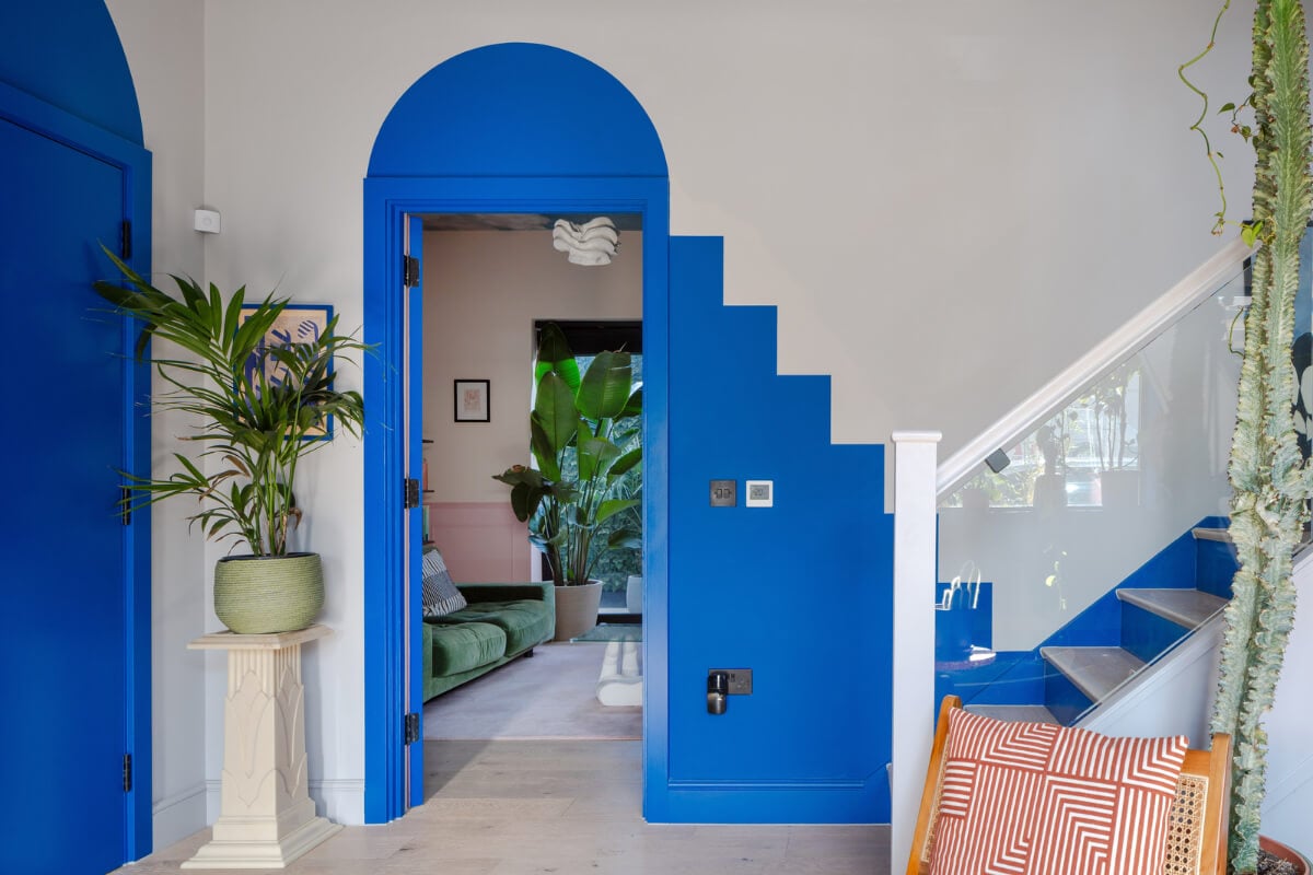 Arched Shapes and Hand-Painted Murals in a Joyful London Townhouse 4 blue wall features