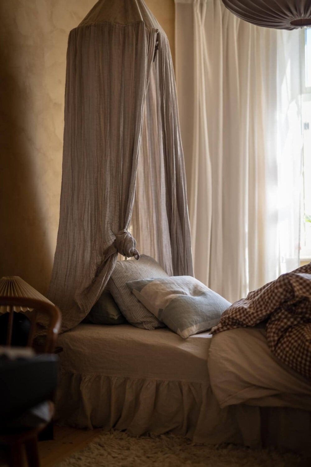 A Natural Color Palette, Period Features, & Grand Rooms in a Swedish Home 33 boho-style bedroom canopy