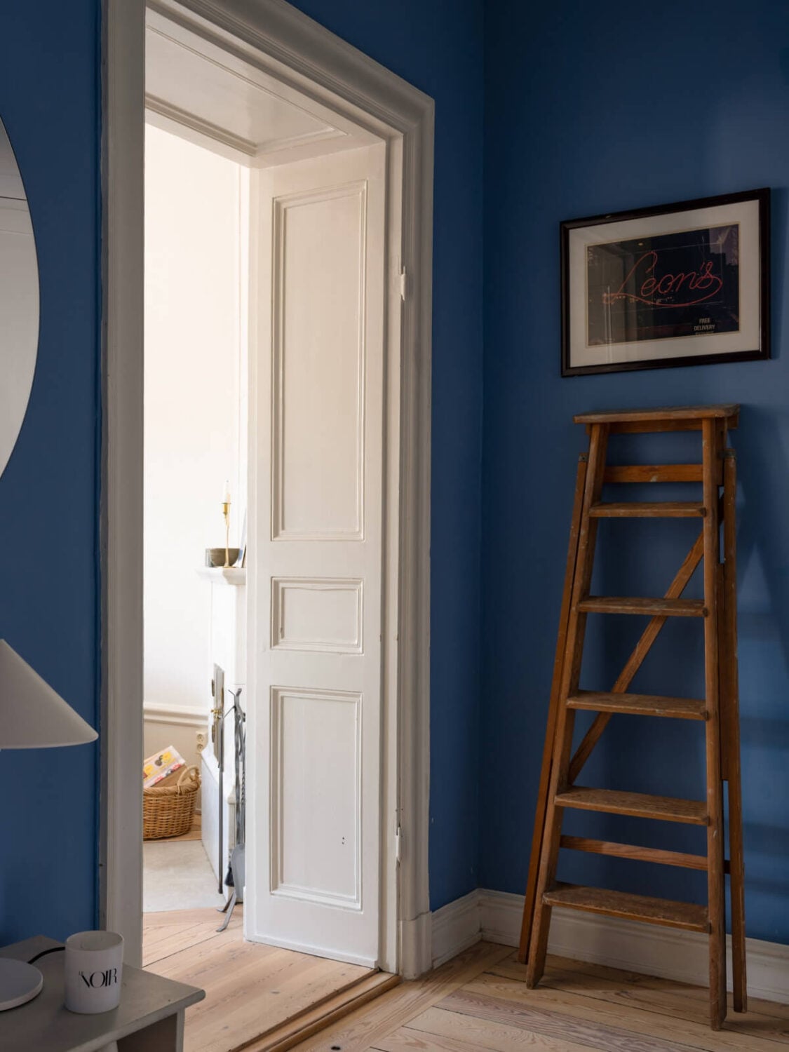 Turn-of-the-Century Charm and Site-Built Storage in a Stockholm Apartment 25 bright blue hall