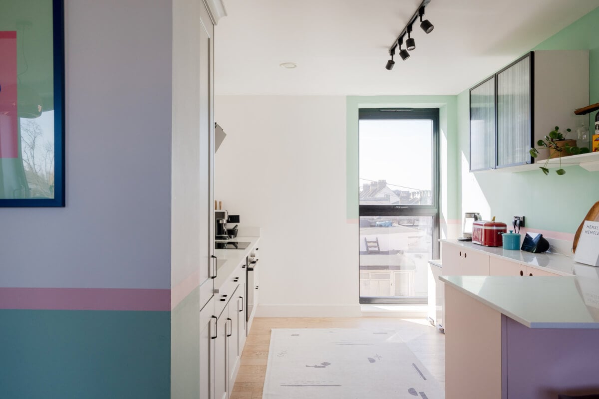 Arched Shapes and Hand-Painted Murals in a Joyful London Townhouse 12 bright kitchen space